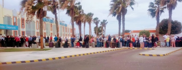 UK nationals wait to board rescue flights out of Sal following travel ban announcement.